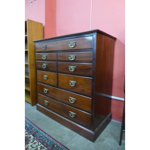 143 - A Victorian mahogany chest of drawers, fitted with trouser press