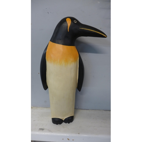 1309 - An ornamental wooden penguin, H 35cms (COLL1311)   #