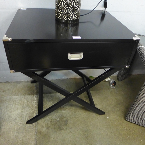 1317 - A black side table with cross legs
