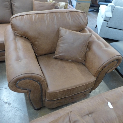 1386 - A County four seater sofa and armchair * this lot is subject to VAT