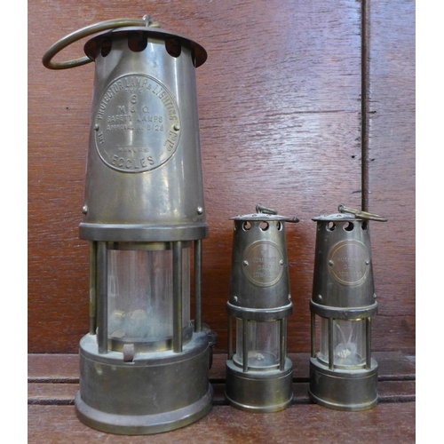 601 - An Eccles Type 6 miner's lamp and two smaller