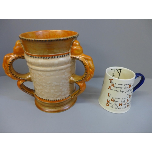 605 - A Crown Ducal three handled vase and a Carlton ware In Loving Memory mug