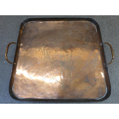 609 - A copper two handled square tray with Father Time engraving