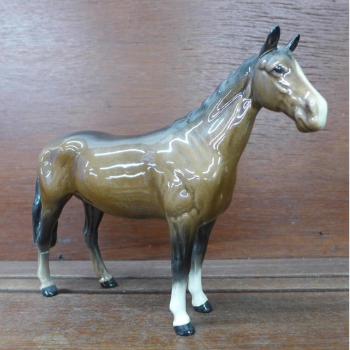 611 - A Beswick horse figure, rear hind leg a/f