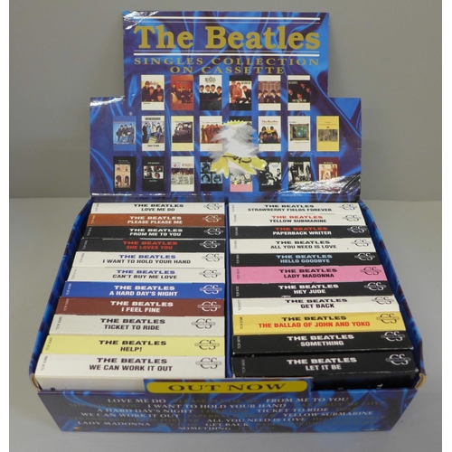 616 - A The Beatles shop display of singles and cassettes (22)
