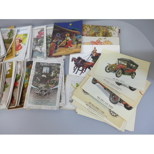 629 - A box of approximately 150 Edwardian greetings cards and postcards