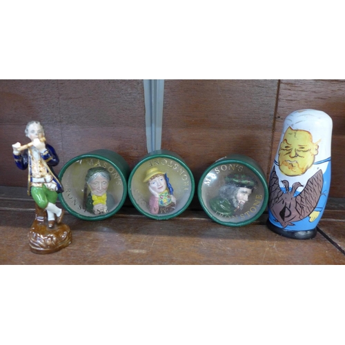 638 - A Russian doll of Russian political figures, three miniature Mason's Ironstone character mugs and a ... 