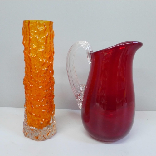 640 - Two items of Whitefriars glass, a bark finger vase in tangerine, 14cm and a ruby jug