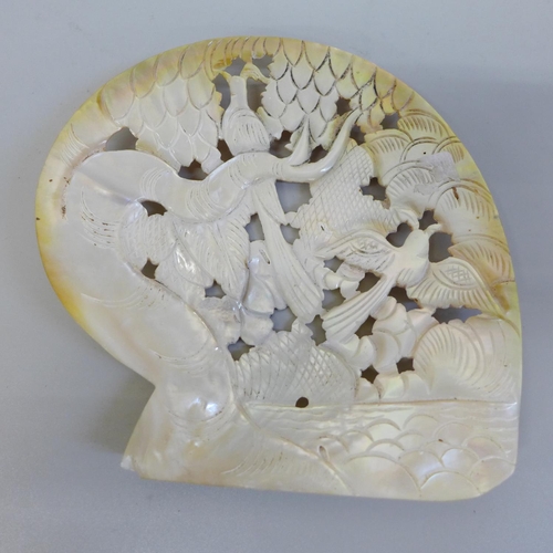 641 - A carved mother of pearl shell dish