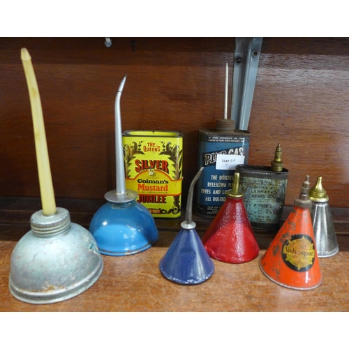 651 - Eight vintage oil cans including Valvespout, PlusGas and a tin of Colman's Mustard tin with original... 