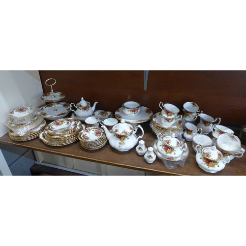 654 - A large collection of Royal Albert Old Country Roses china, twelve setting including tea pots, cake ... 