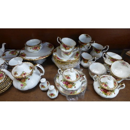 654 - A large collection of Royal Albert Old Country Roses china, twelve setting including tea pots, cake ... 