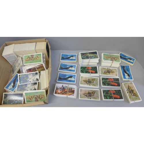 671 - A collection of Grandee-Doncella cigarette cards, full sets and part sets, many themes including wil... 