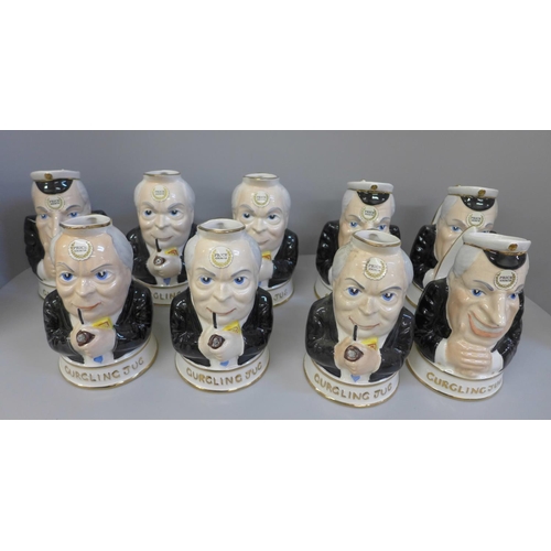 711 - A collection of Kensington character 'gurgling' jugs
