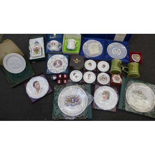 723 - A collection of assorted Royal Family commemorative china including Spode, Royal Doulton and Royal A... 