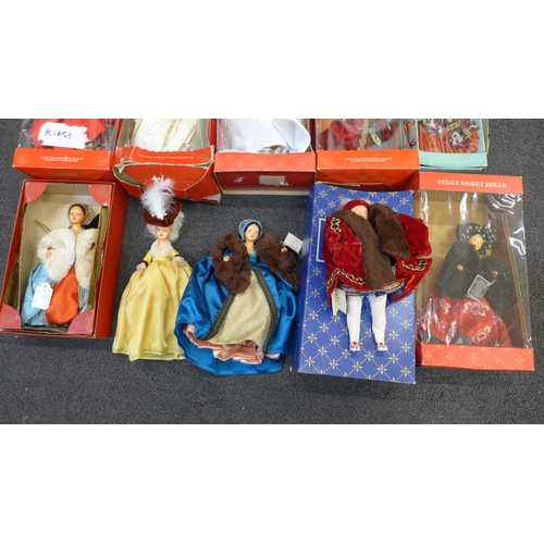732 - A collection of ten vintage Peggy Nisbet dolls including Henry VIII and Diana