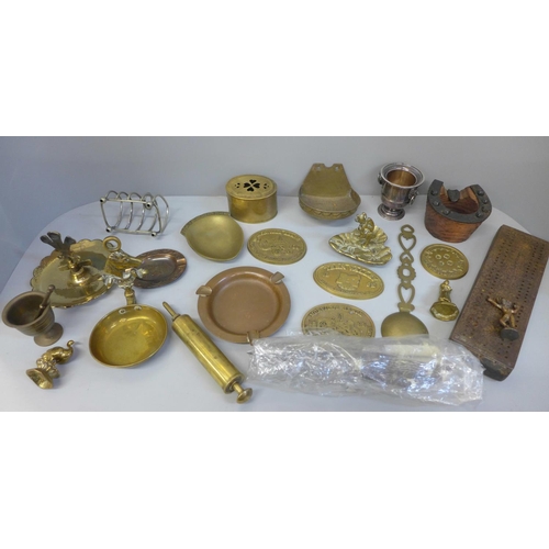 733 - A collection of metalware including brass and a wooden cribbage board