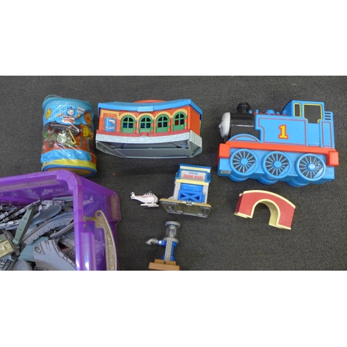 738 - A large collection of Thomas the Tank Engine model trains and other Thomas merchandise