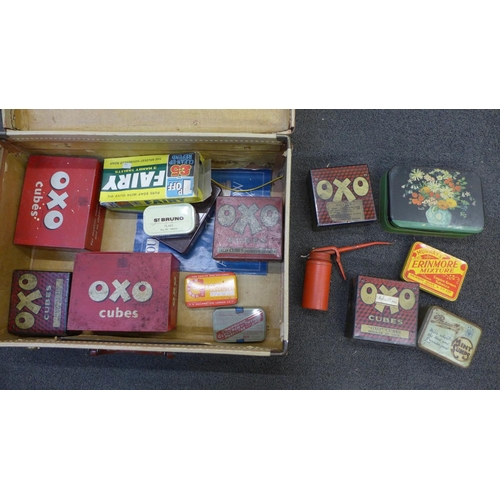 740 - A collection of tins including Oxo, a Wesco oil can and Fairy Soap advertising