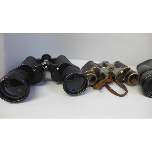 747 - Four pairs of binoculars, including leather cased