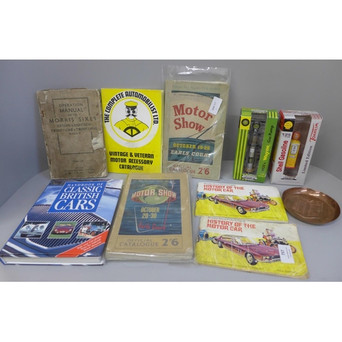 757 - A Pratts Perfection spirit copper pin tray and a collection of car related books, and two model gas ... 