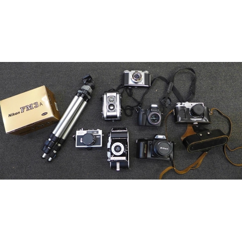 763 - A Nikon F-401 camera, other cameras include Zorki-4, Coronet, Zeiss Ikon, Kodak Duaflex, Kodak Easys... 