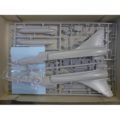 773 - Five model aeroplane kits including Revell, Dragon, Italeri, Fujimi, etc.
