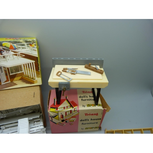 855 - A Corgi Kits 611 Motel Chalet, two Tri-ang by Spot-On Doll's House Furniture, a Britain's petrol pum... 