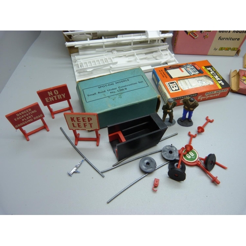 855 - A Corgi Kits 611 Motel Chalet, two Tri-ang by Spot-On Doll's House Furniture, a Britain's petrol pum... 