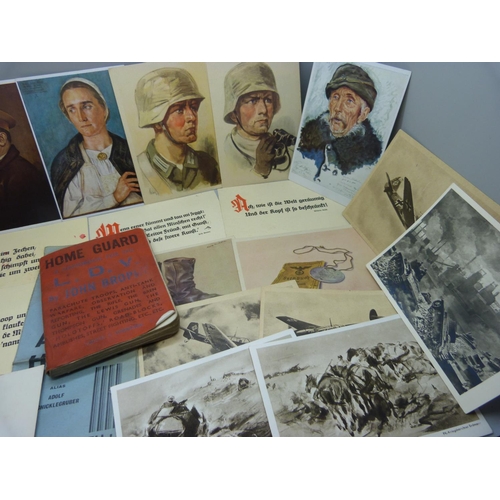 859 - A collection of German WWII postcards and a Home Guard handbook