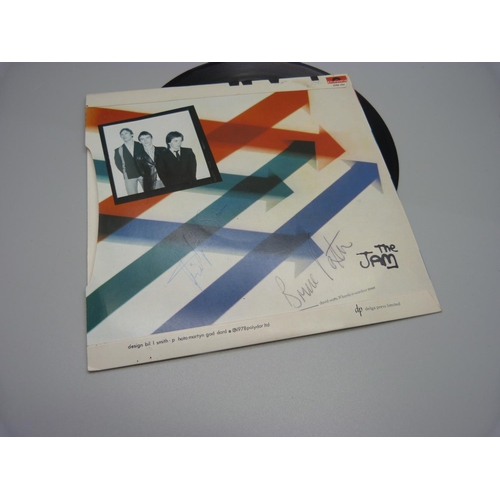 861 - The Jam autographed single, Paul Weller, Bruce Foxton and Rick Buckler