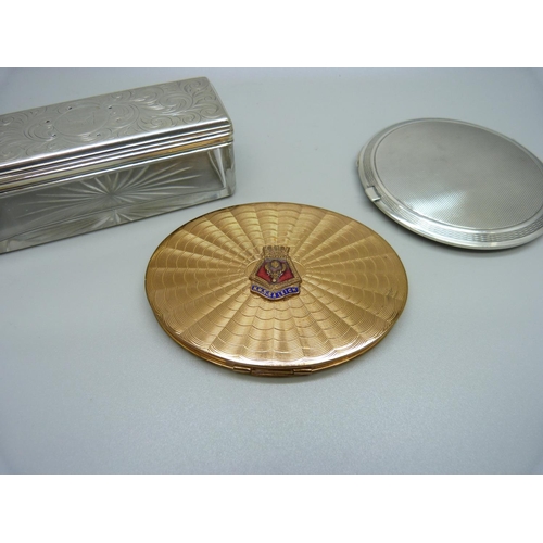 880 - A silver Art Deco style compact, an HMS Raleigh compact and a Victorian silver topped glass pot