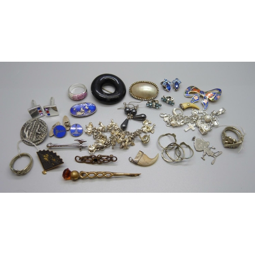 937 - Jewellery including puzzle rings, charm bracelets, etc.