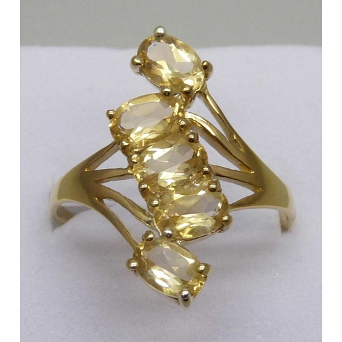 956 - A silver gilt and citrine 'bypass' ring, V