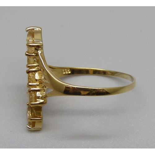 956 - A silver gilt and citrine 'bypass' ring, V