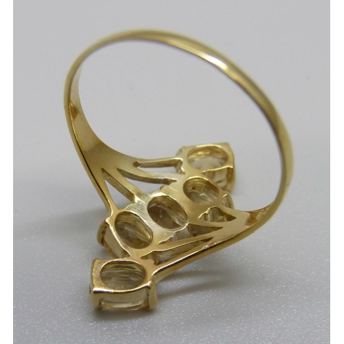 956 - A silver gilt and citrine 'bypass' ring, V