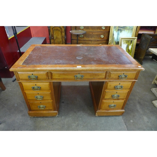 10 - A Victorian walnut pedestal desk
