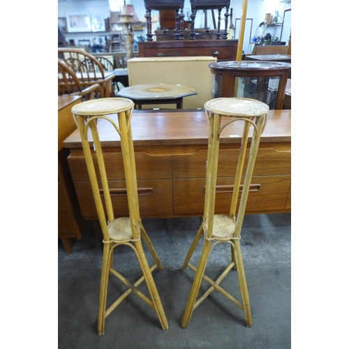 100 - A pair of bamboo plant stands