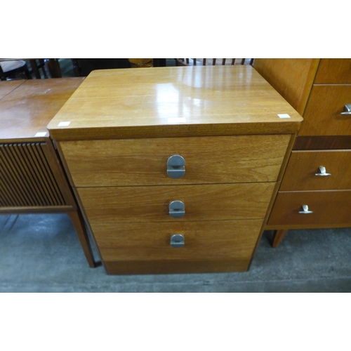 102 - A small teak chest of drawers