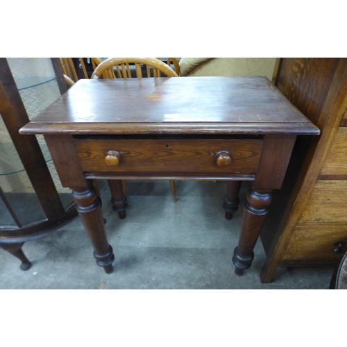 128 - A Victorian pitch pine single drawer kitchen table