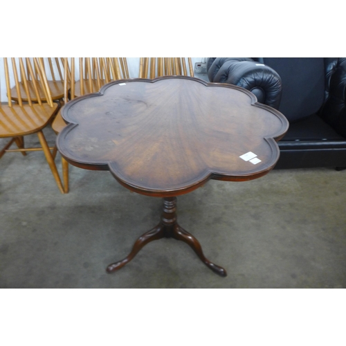 134 - A Reprodux mahogany tripod tea table
