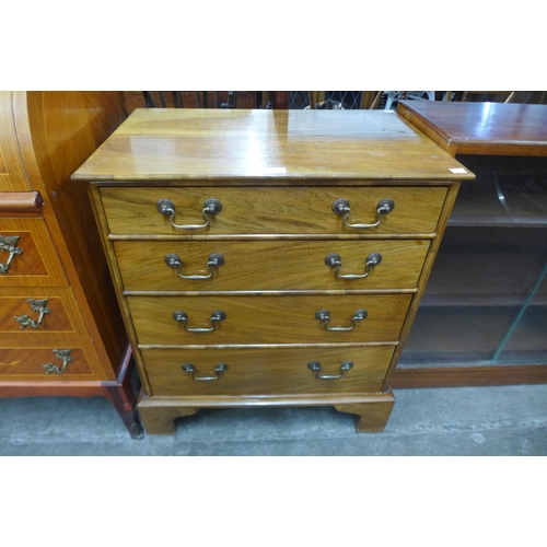 135 - A small George III style mahogany bachelors chest of drawers