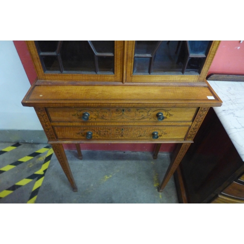 147 - A late Victorian Sheraton Revival inlaid satinwood side cabinet