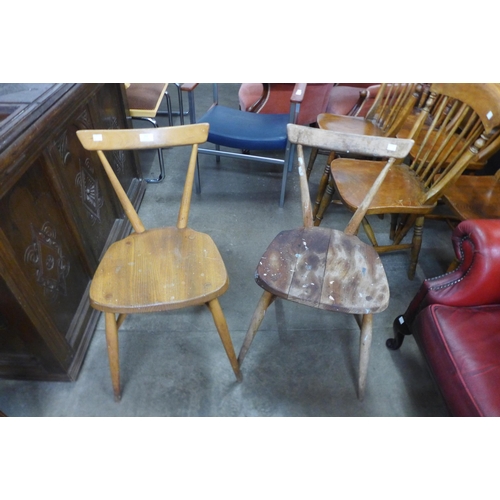152 - Two Ercol elm and beech stacking chairs
