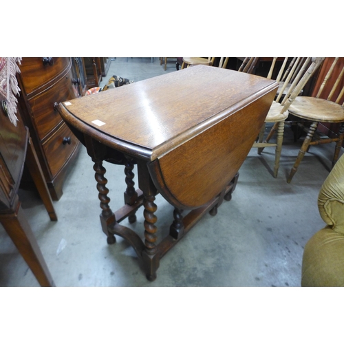 155 - An oak barleytwist gateleg table