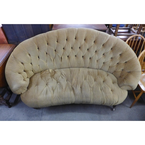 156 - A Victorian mahogany and fabric upholstered settee
