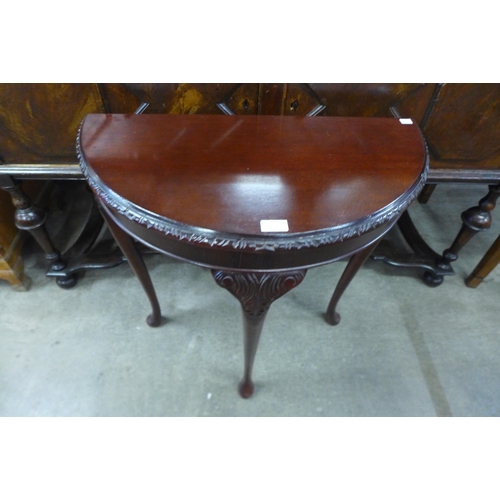 159 - A mahogany demi-lune hall table