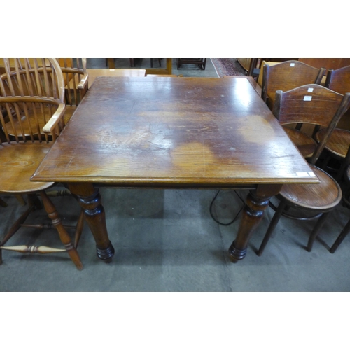 169 - A square oak pub table