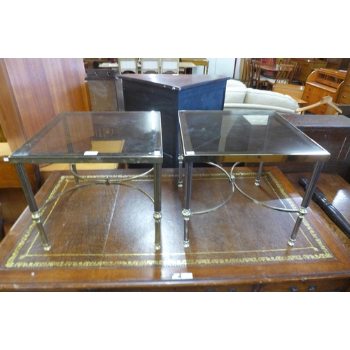 173 - A pair of Italian brass and glass topped occasional tables