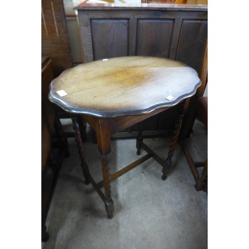 174 - An oak barleytwist occasional table
